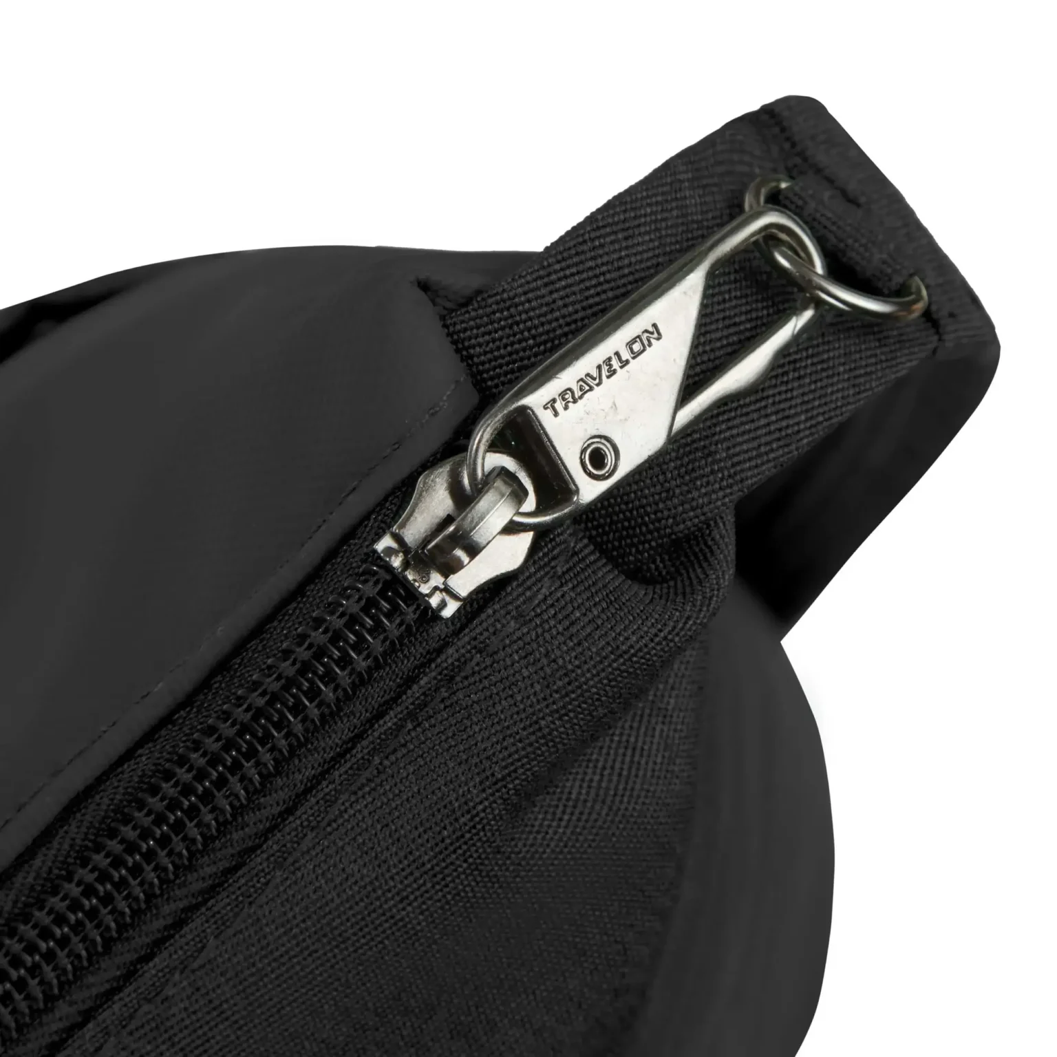 Detail van de vergrendelbare ritsen op de Travelon Metro M Crossbody Tas (3)