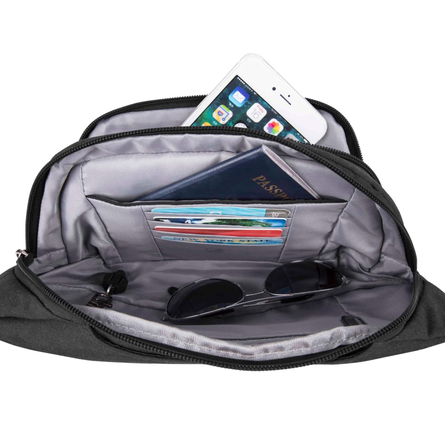 Hoofdvak van de Travelon Metro Waistpack met telefoon, pasjes en zonnebril