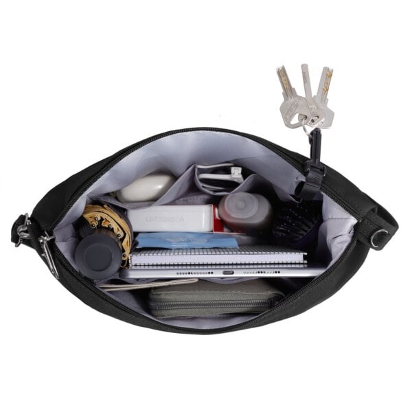 Hoofdvak van de Travelon Metro Crossbody M met notitieboek en sleutelclip