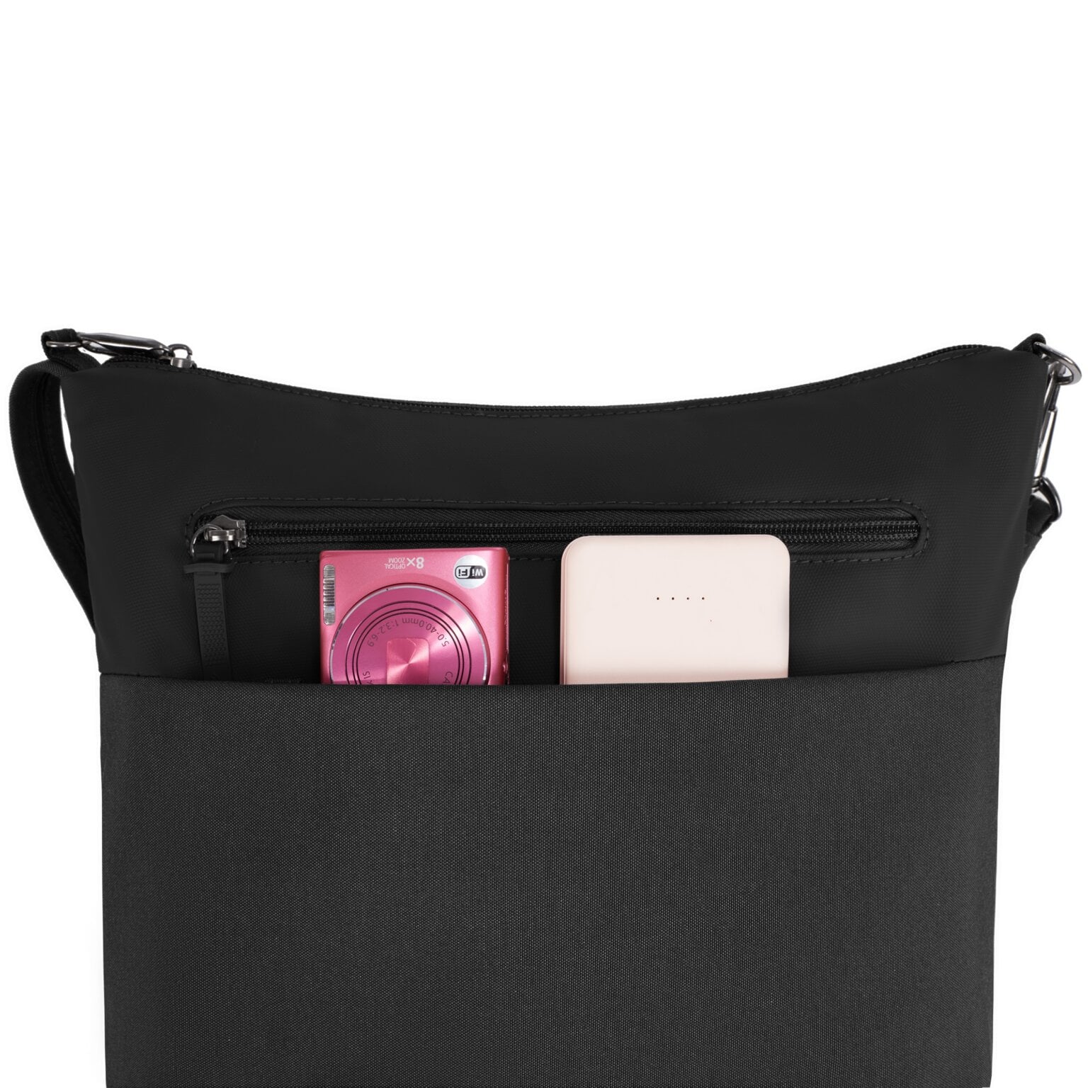 Voorvak van de Travelon Metro Crossbody M met camera en powerbank