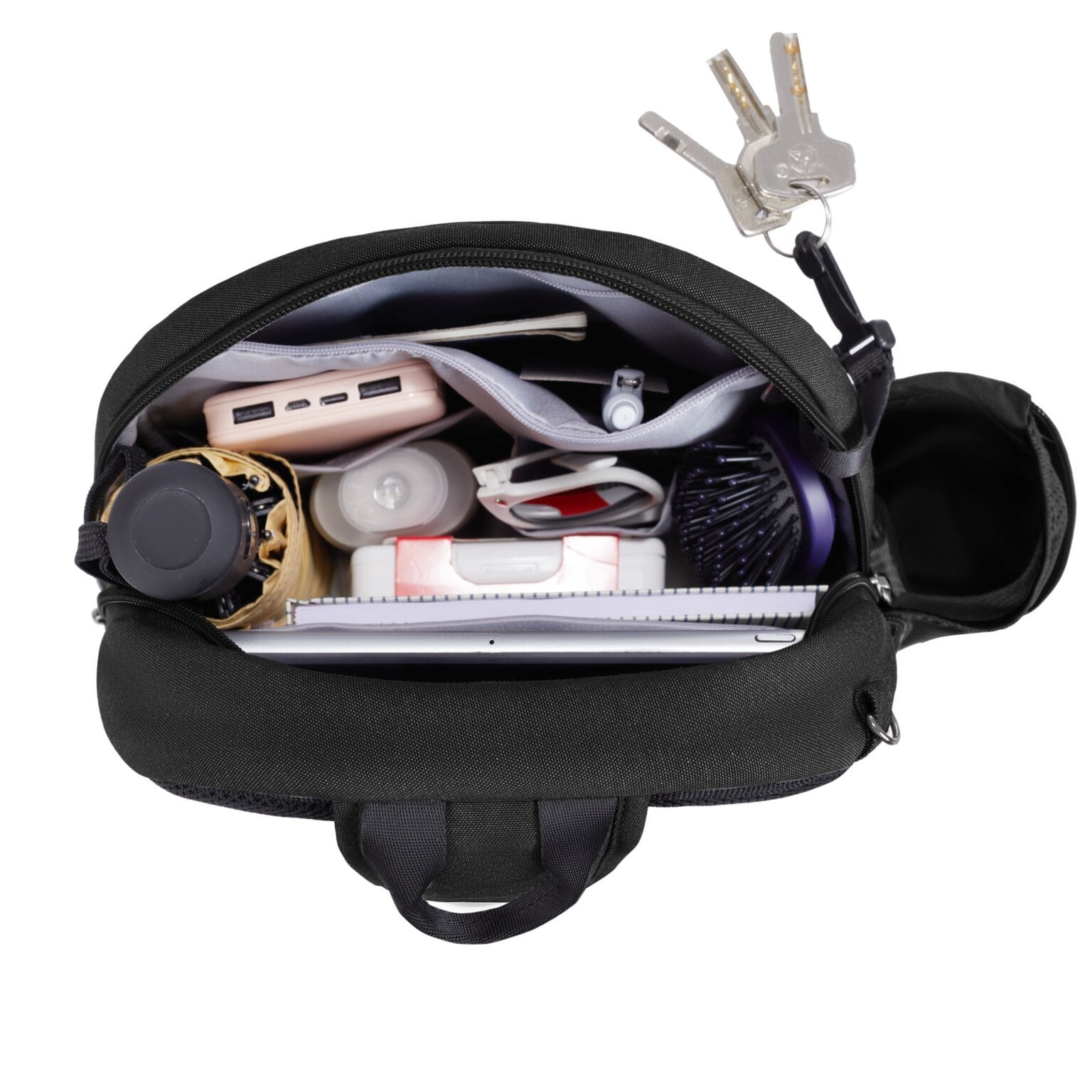 Hoofdvak van de Travelon Metro Sling Bag met horloge, cosmetica en sleutelclip