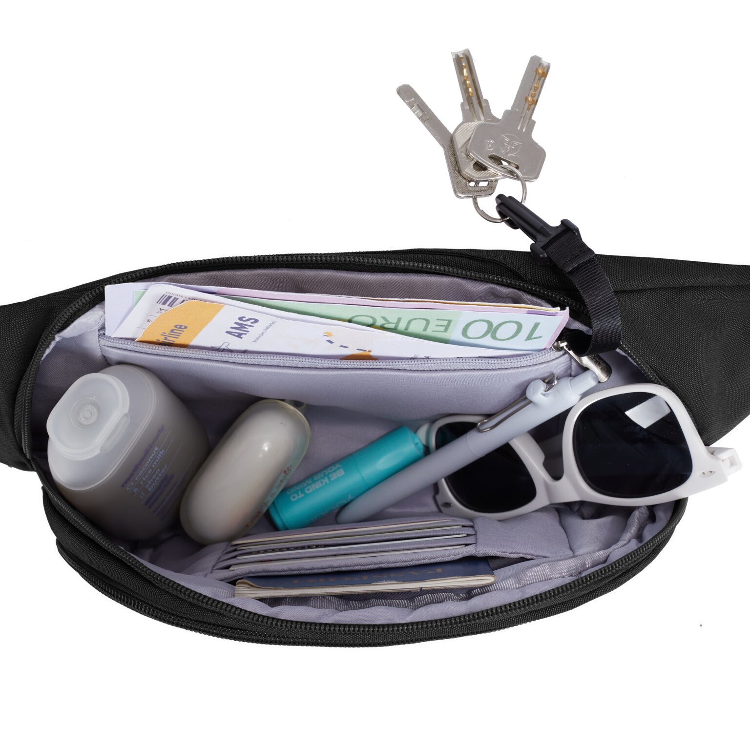 Travelon Metro Waistpack open met toiletartikelen, zonnebril en sleutelclip