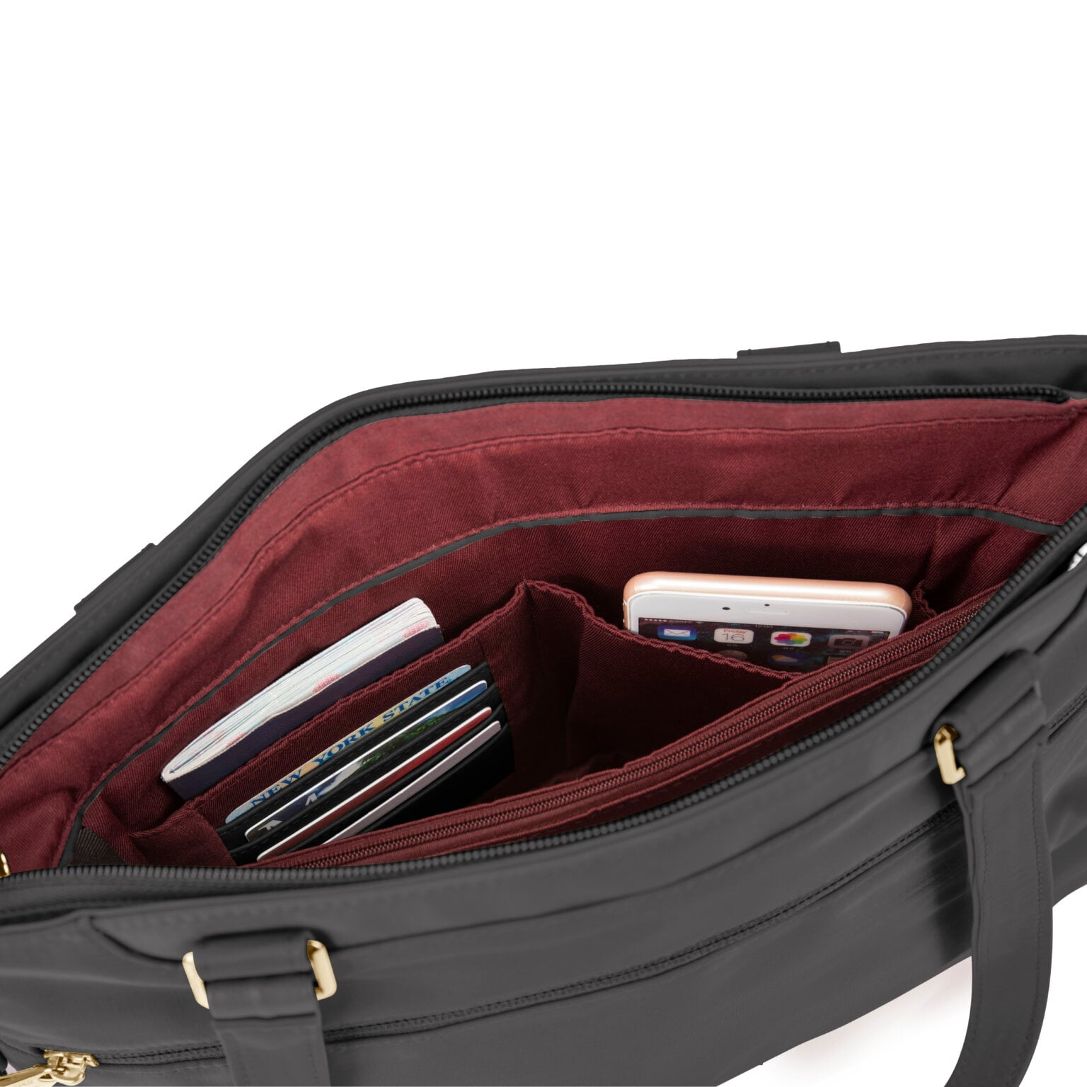 Binnenvakken van de Travelon Addison tote in zwart met pasjes, pennen en telefoon