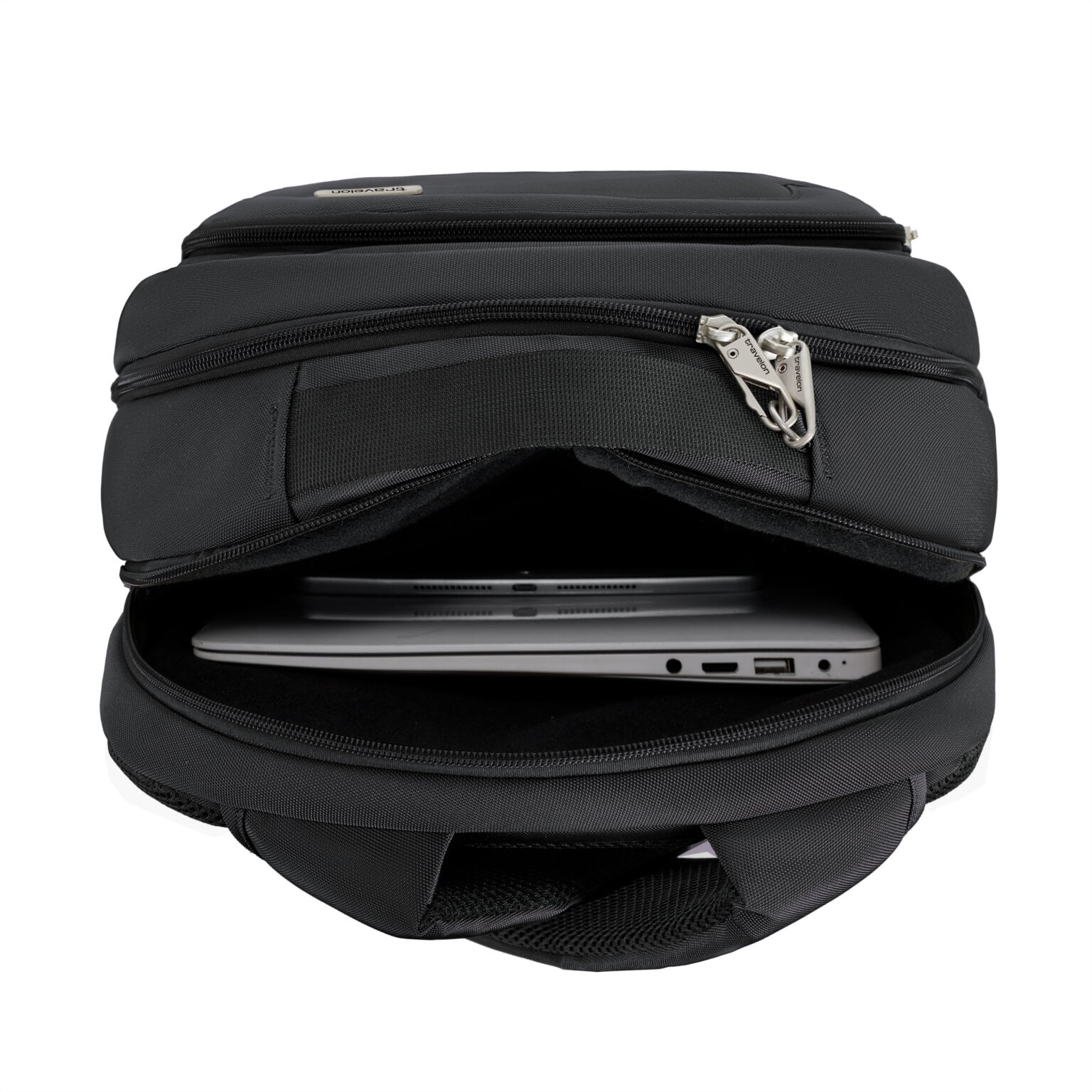 Laptopvak van de Travelon Classic Journeys rugzak in zwart met een laptop van 15,6 inch