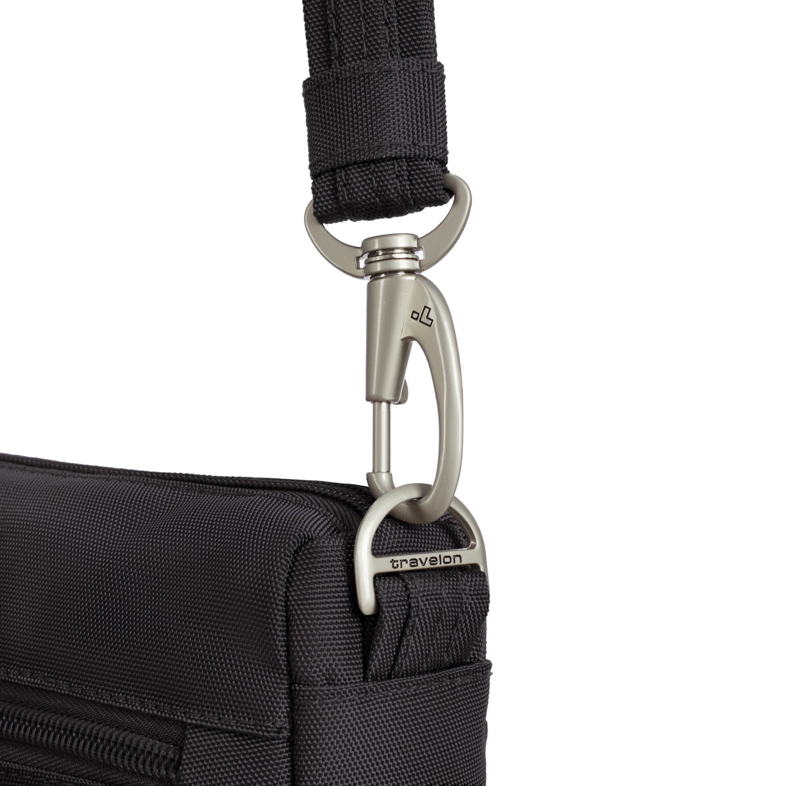 Lockdown-bevestiging van de schouderband van de Travelon Classic kleine crossbody tas in zwart
