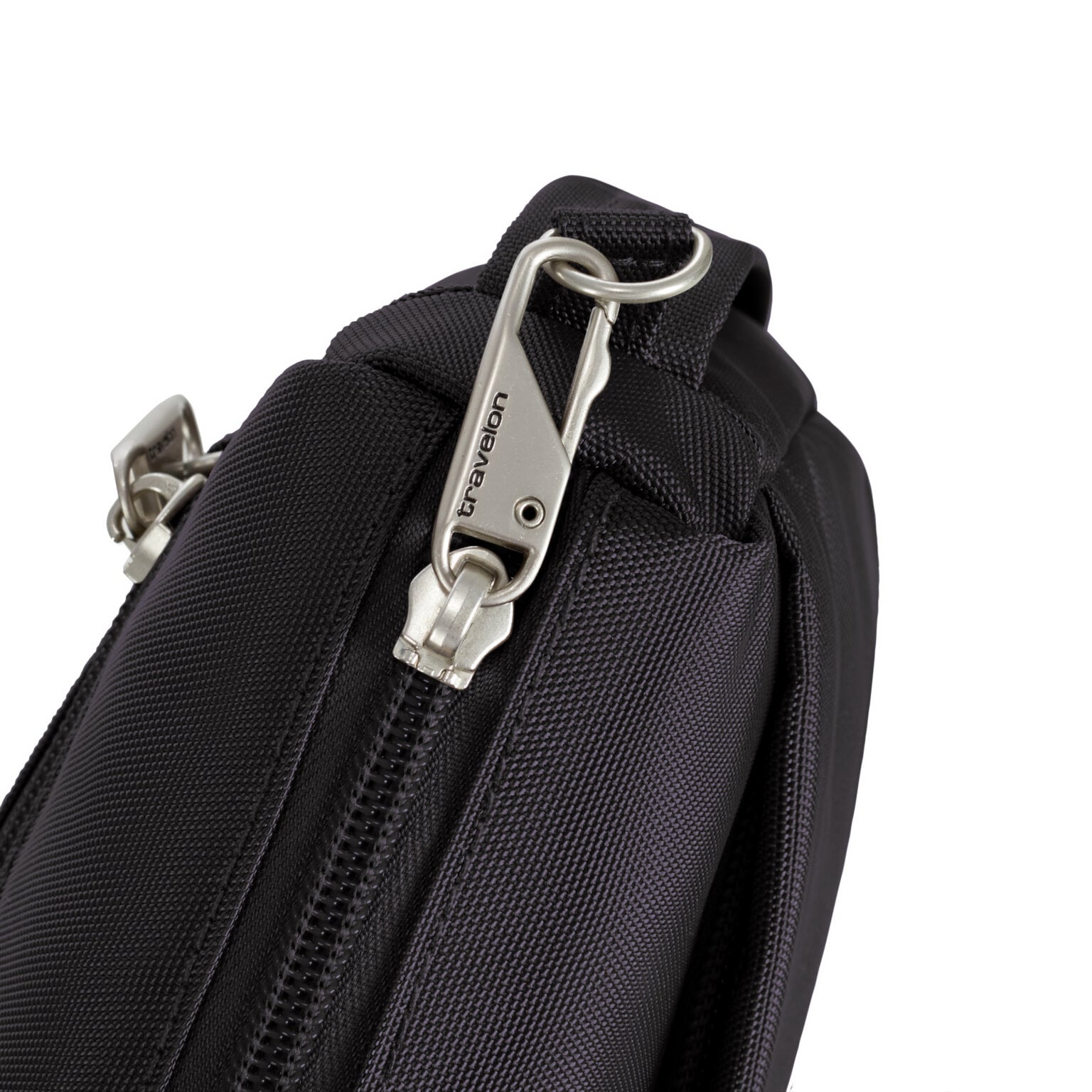 Vergrendelbare ritstrekkers van de Travelon Classic kleine crossbody tas in zwart
