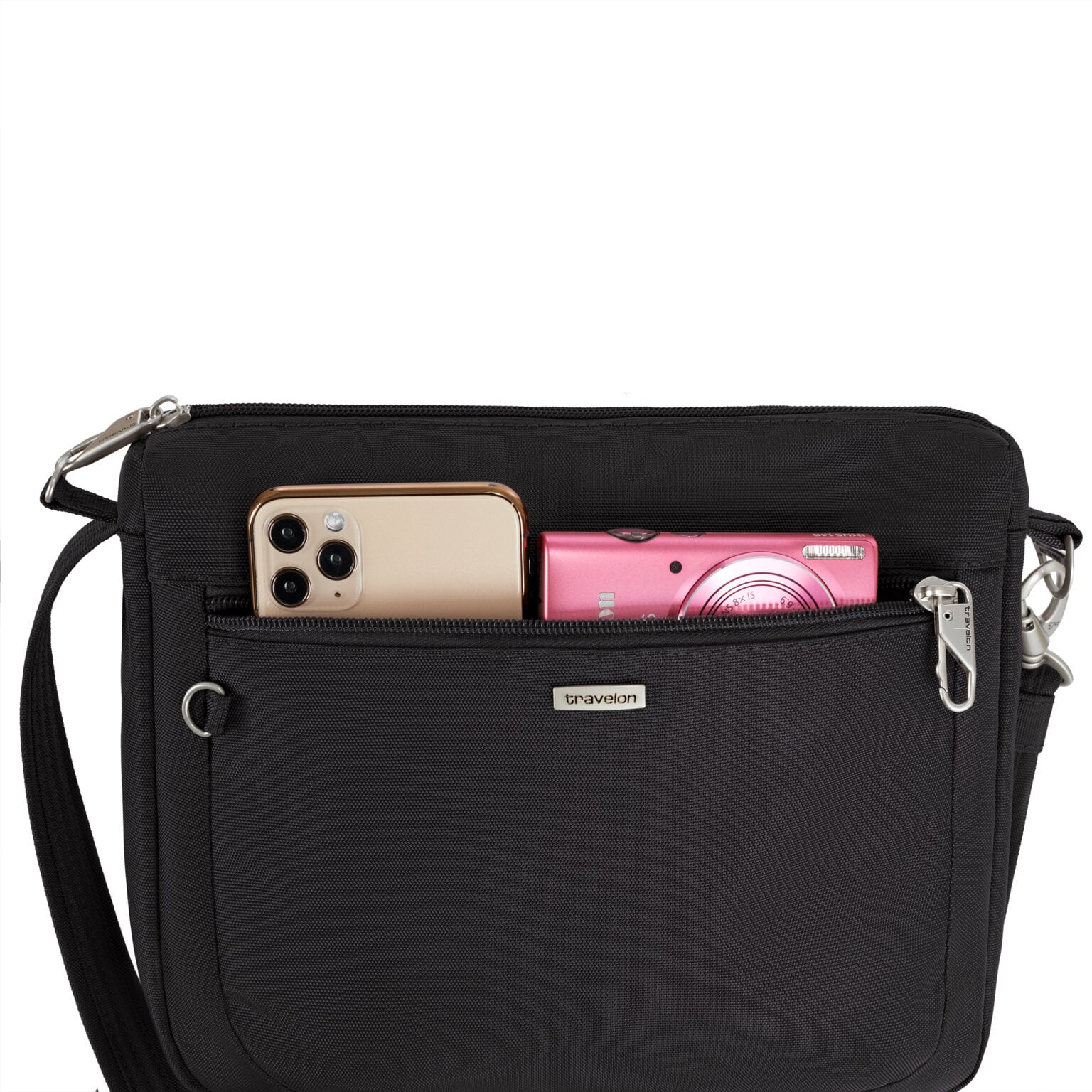 Voorvak van de Travelon Classic kleine crossbody tas in zwart met telefoon en camera