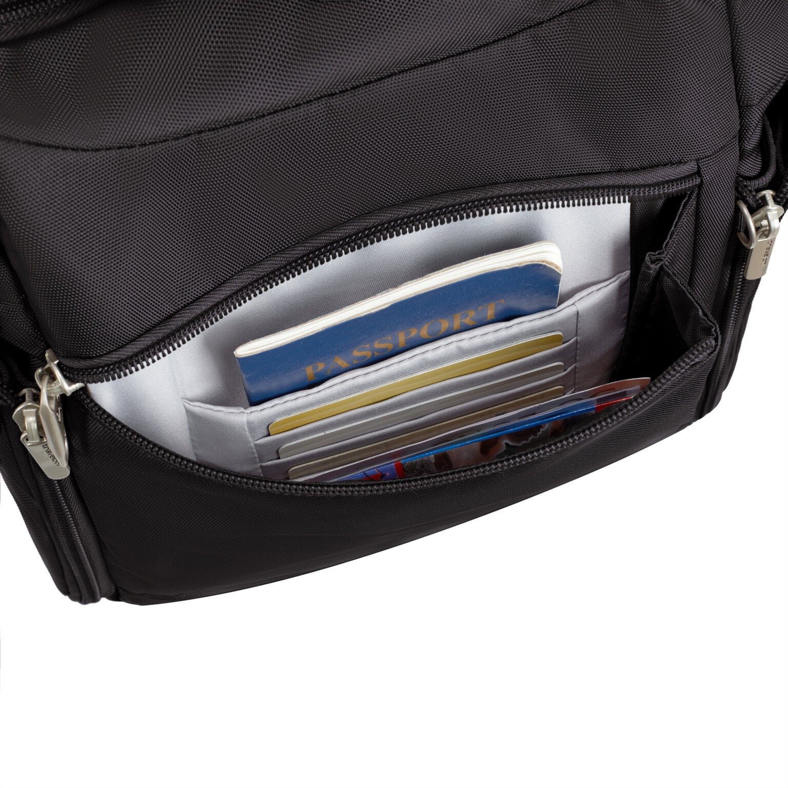 RFID-beschermd achtervak van de Travelon Classic messenger tas in zwart met paspoort en pasjes