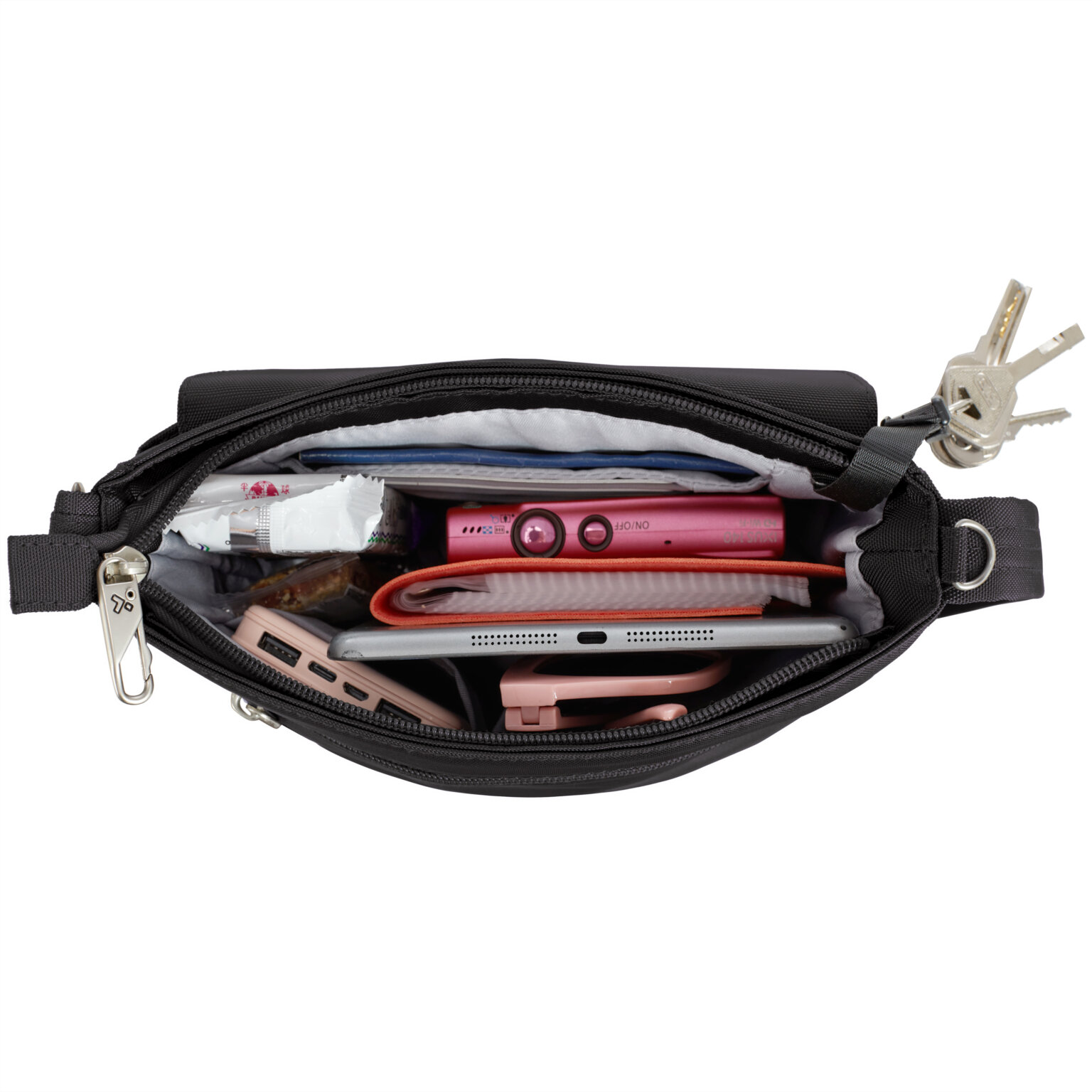 Hoofdvak van de Travelon Classic mini schoudertas in zwart met tablet, oortjes en telefoon
