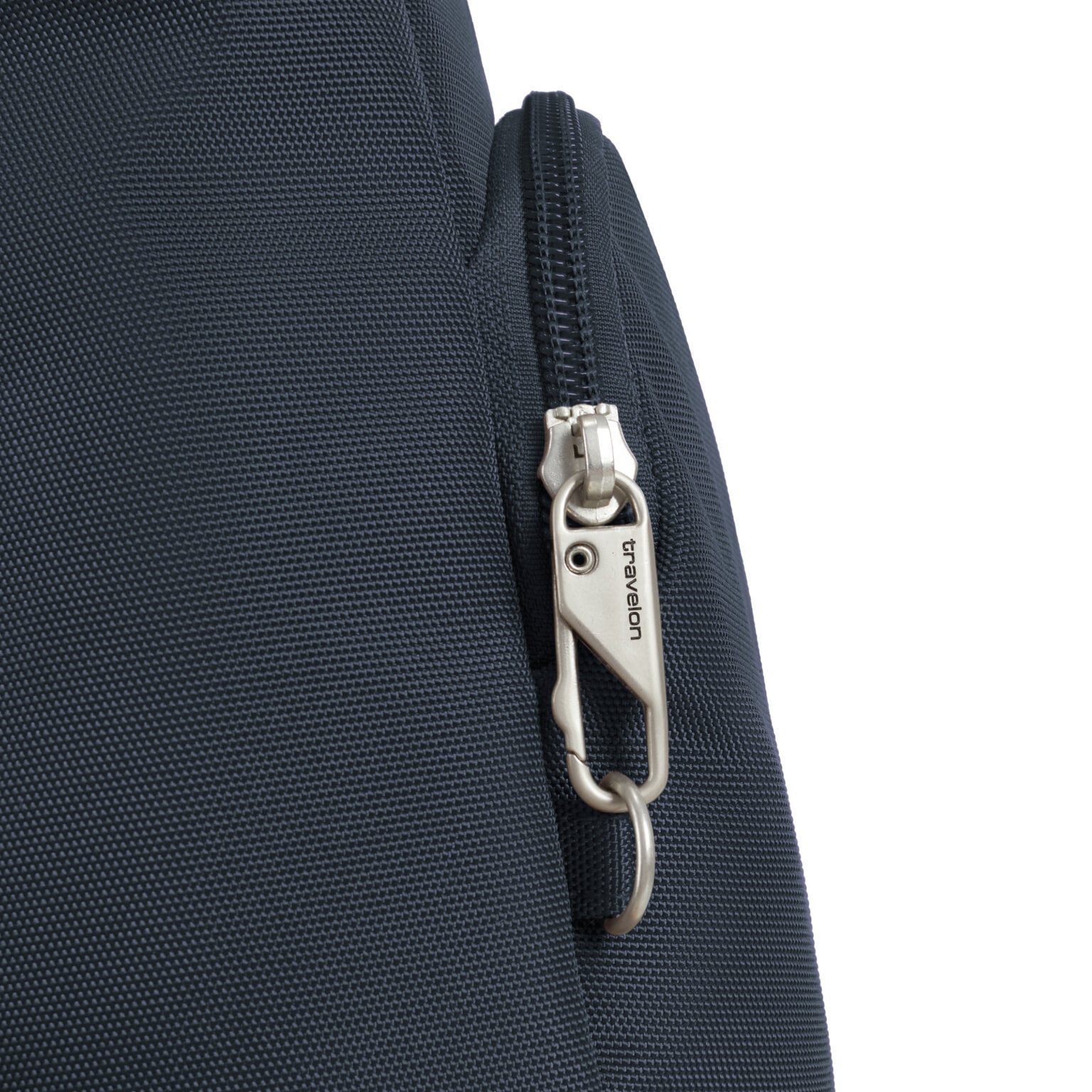 Vergrendelbare ritstrekkers van de Travelon Classic N/S crossbody tas in midnight blauw