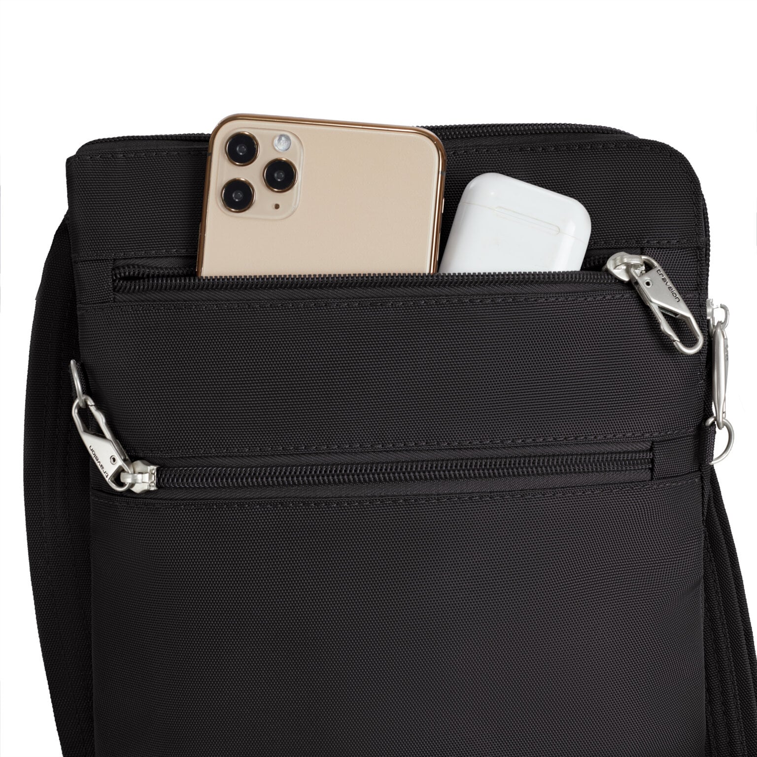 Achtervak van de Travelon Classic slanke crossbody tas in zwart met telefoon en powerbank