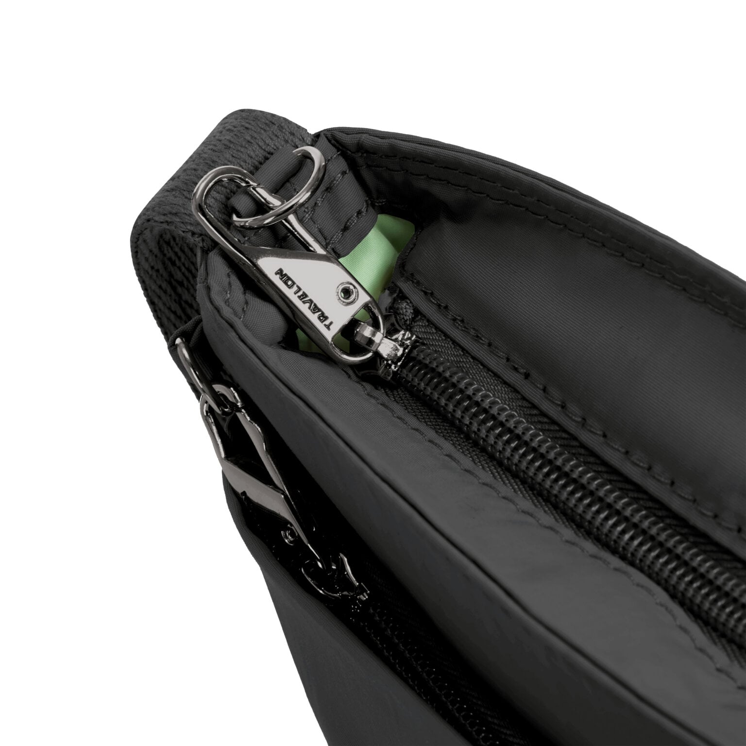 Vergrendelbare ritstrekkers van de Travelon Roam kleine crossbody tas in zwart